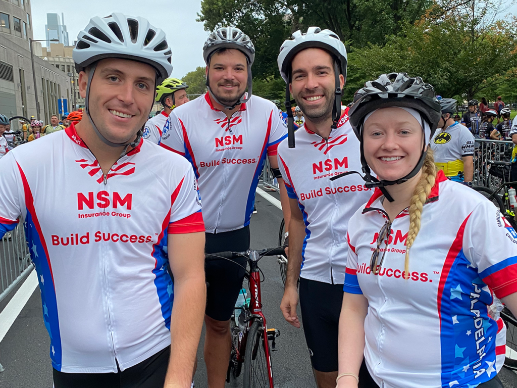 NSM employees on bikes at Ben To The Shore Event
