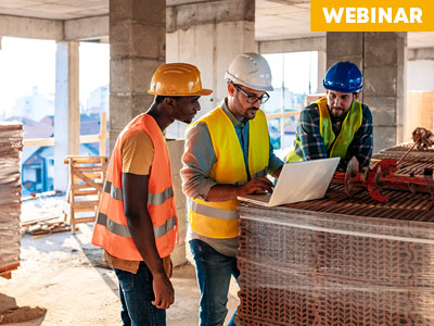 construction men looking over plans